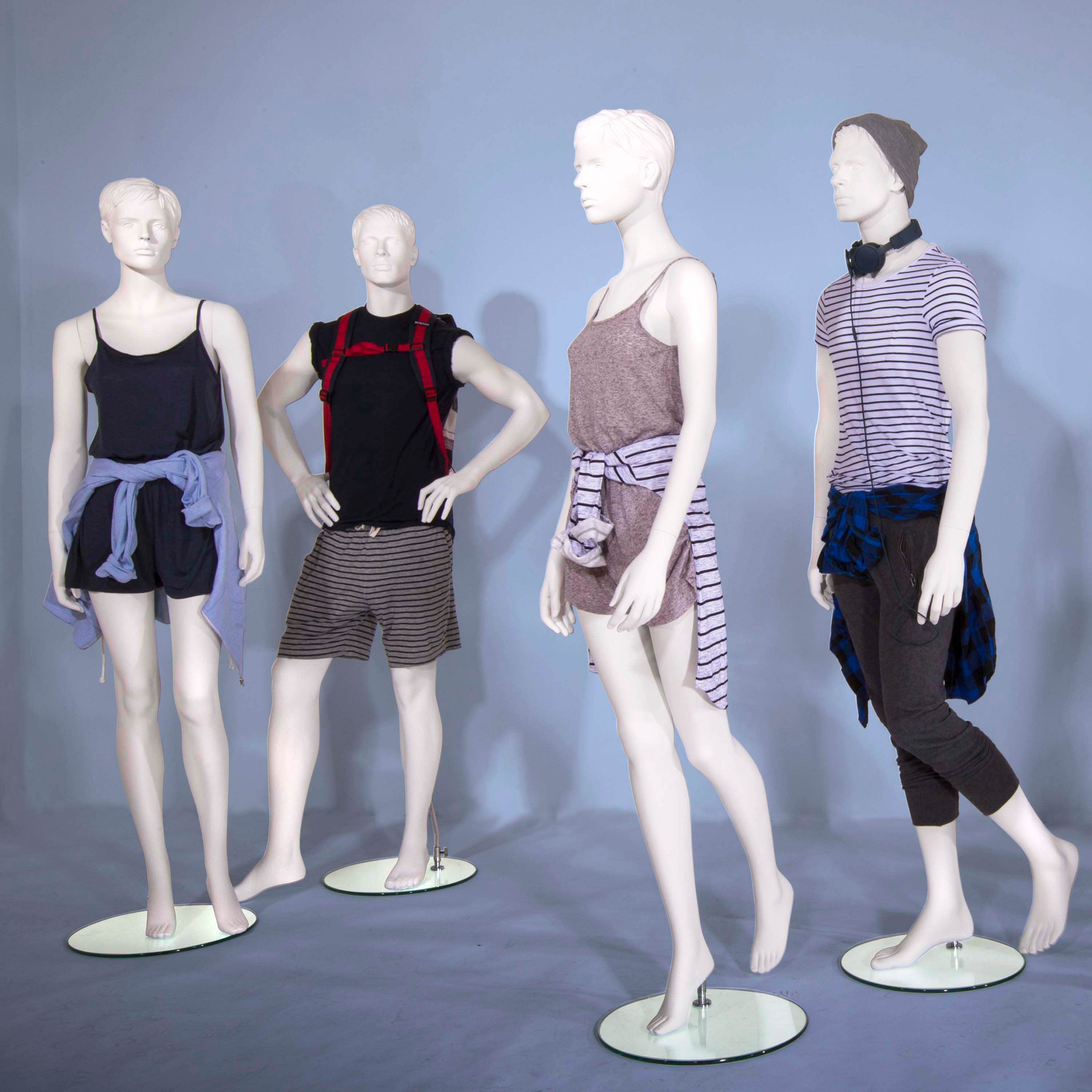 Econoco Female Mannequin - Molded Hair, Hands by Side, Left Leg Slightly Bent