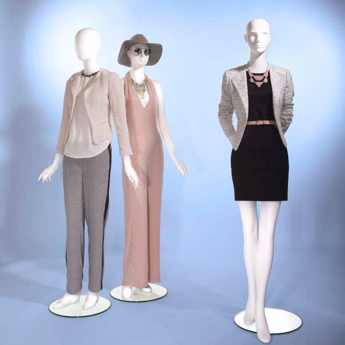 Econoco Female-Abstract Head Facing Straight, Arms at Side, Right Leg Slightly Bent